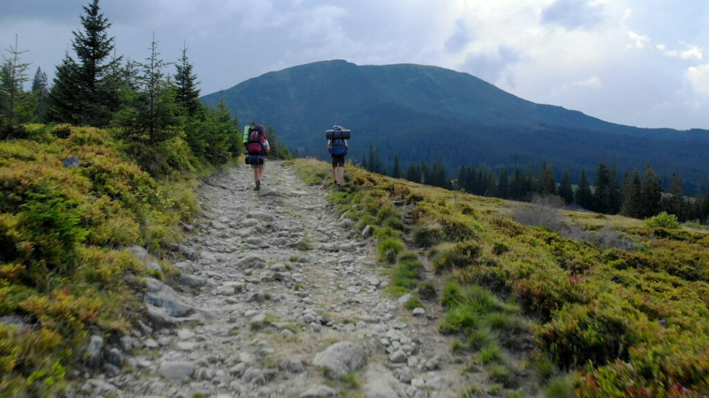 Tourists travel in the mountains.